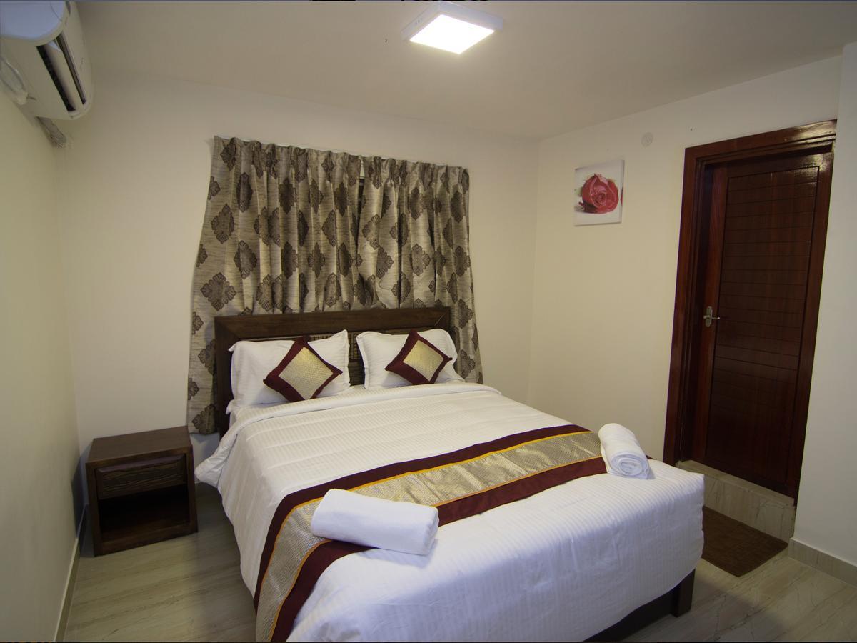 Iris Comfort Inn Chennai Bagian luar foto